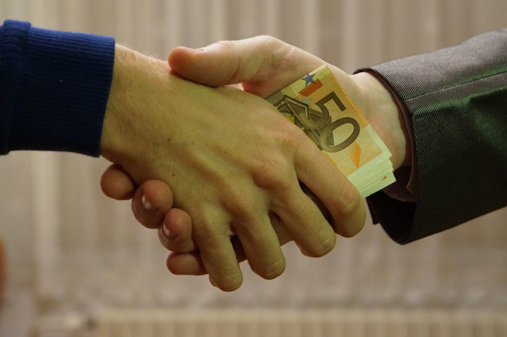10_-_hands_shaking_with_euro_bank_notes_inside_handshake_-_royalty_free_without_copyright_public_domain_photo_image_01