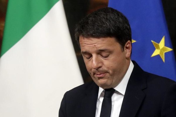Italian Premier Matteo Renzi speaks during a press conference at the premier's office Chigi Palace in Rome, early Monday, Dec. 5, 2016. Renzi acknowledged defeat in a constitutional referendum and announced he will resign on Monday. Italians voted Sunday in a referendum on constitutional reforms that Premier Matteo Renzi has staked his political future on. (ANSA/AP Photo/Gregorio Borgia) [CopyrightNotice: Copyright 2016 The Associated Press. All rights reserved.] 