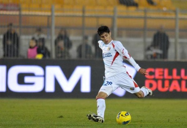 Catania's argentinian midfielder Pablo Cesar Barrientos scores the winning goal of 1-0 during the last minutes of the serie A soccer match Lecce-Catania this evening, 26 november 2011, at Via del Mare stadium in Lecce (Italy). Ansa/ Claudio Longo 