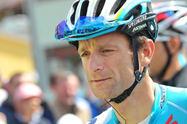 Michele Scarponi of Astana team during signature operations bepore the departure for the sixth stage, 247 km from Sassano to Montecassino, of the 97th Giro d'Italia cycling race, Italy, 15 May 2014. ANSA/LUCA ZENNARO 