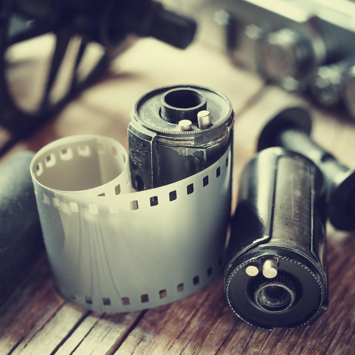 Old photo film rolls, cassette and retro camera. Vintage stylized. 